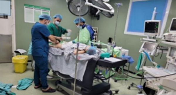 Surgery at Al-Ahli Hospital, Gaza.