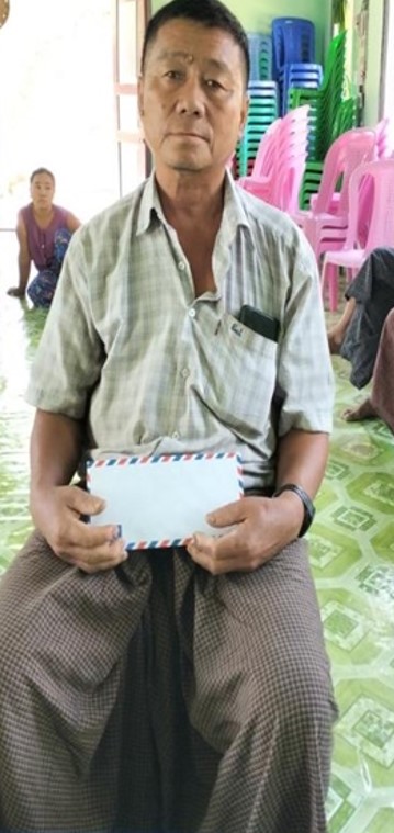 Khin Maung received rice from his local CPM church. © CPM. Used with permission.