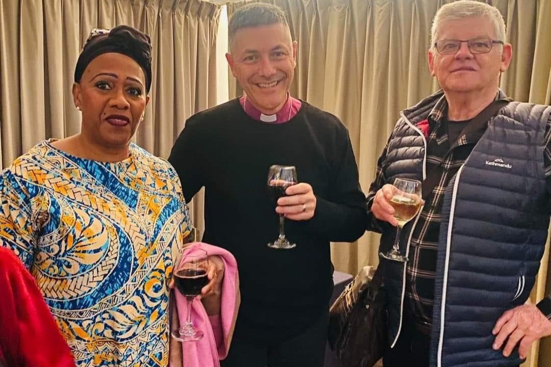 Archbishop of Brisbane, the Very Rev’d Jeremy Greaves, with two ABM supporters at the dinner. © ABM. Used with permission.