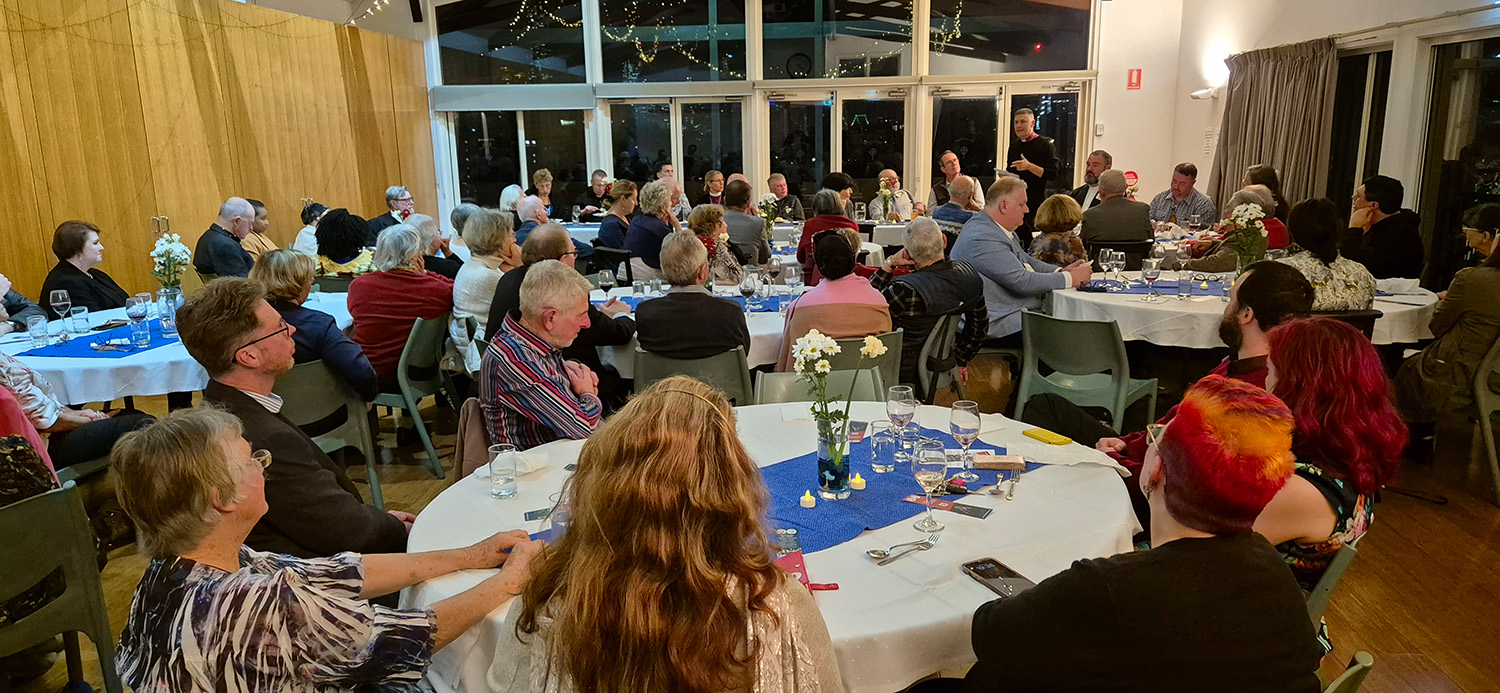 ABM supporters listen to Archbishop Jeremy at the dinner. © ABM. Used with permission.