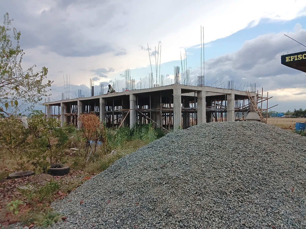 The two-storey school building under construction.