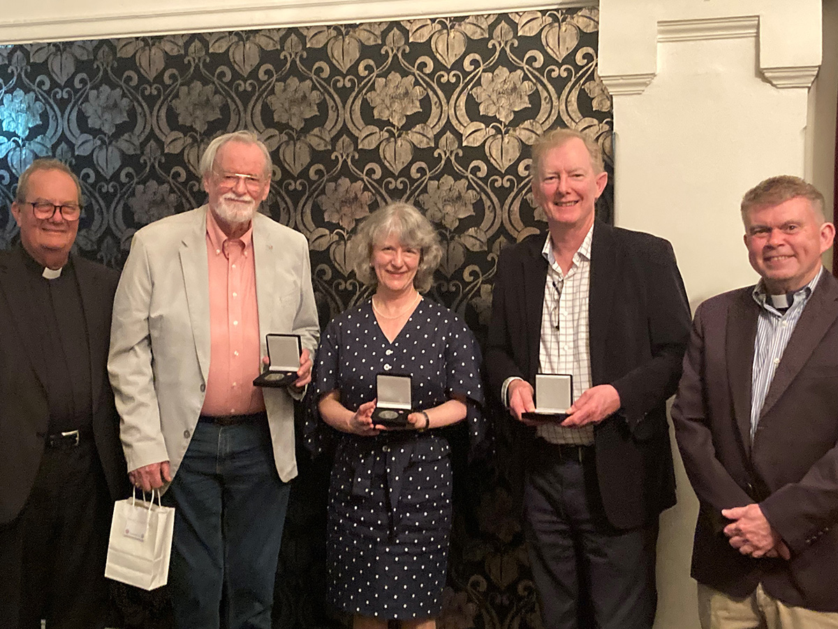 Michael, Linda and Edwin are joined by ABM Board Chair, the Rev’d Andrew Sempell (L) and ABM Executive Director, the Rev’d Dr John Deane (R) after receiving their Coaldrake Awards. © Meagan Schwarz, ABM.