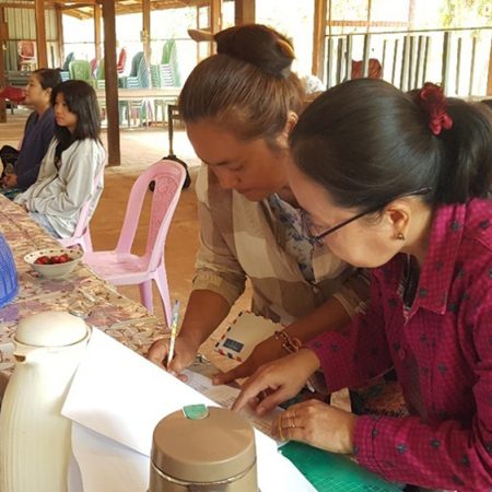 A woman who has lost her home in the Myanmar conflict signs up for emergency relief from the church. © CPM. Used with permission.